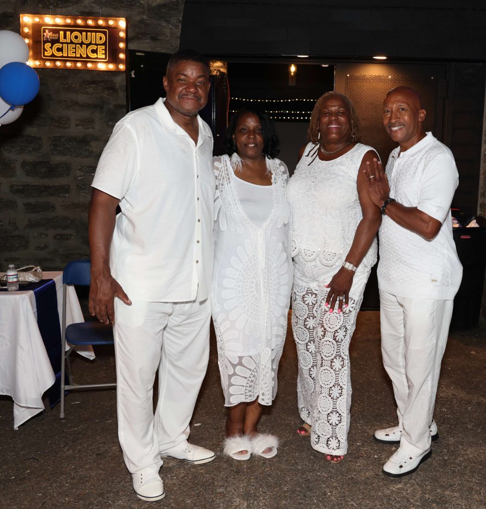 Guests enjoying the science outreach celebration - STEM Center Fundraising event for science education at the Grand Hank STEM Center in Philadelphia.