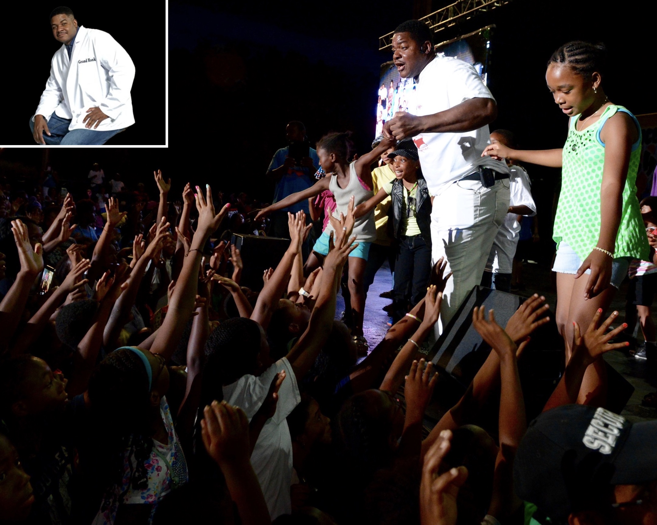 Grand Hank presenting science, engineering, technology, and math outreach programs on stage for k-8 STEM students